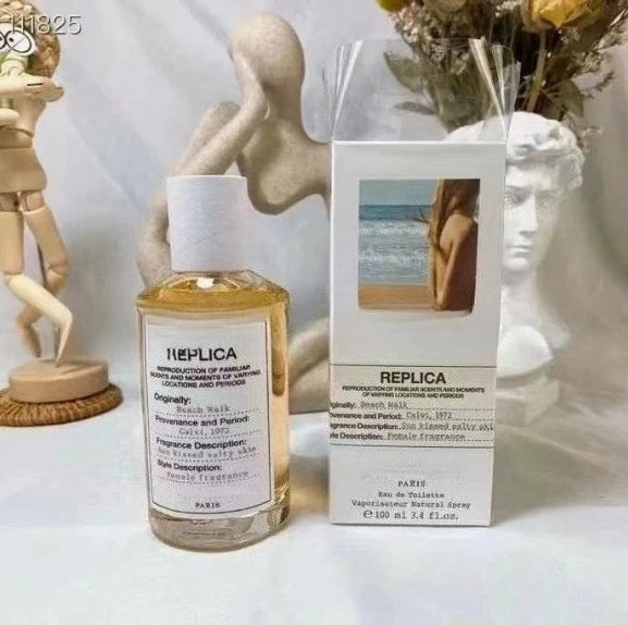 theelegancejewellery 100ml Unisex Pheromone Perfume Long Lasting Woody Floral Natural Fragrance Charming Cologne in a tall glass bottle with white cap and black label, packaged in a rectangular box.